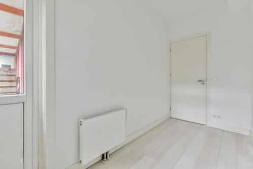 chauffagiste Le Mée-sur-Seine - Une chambre avec un radiateur